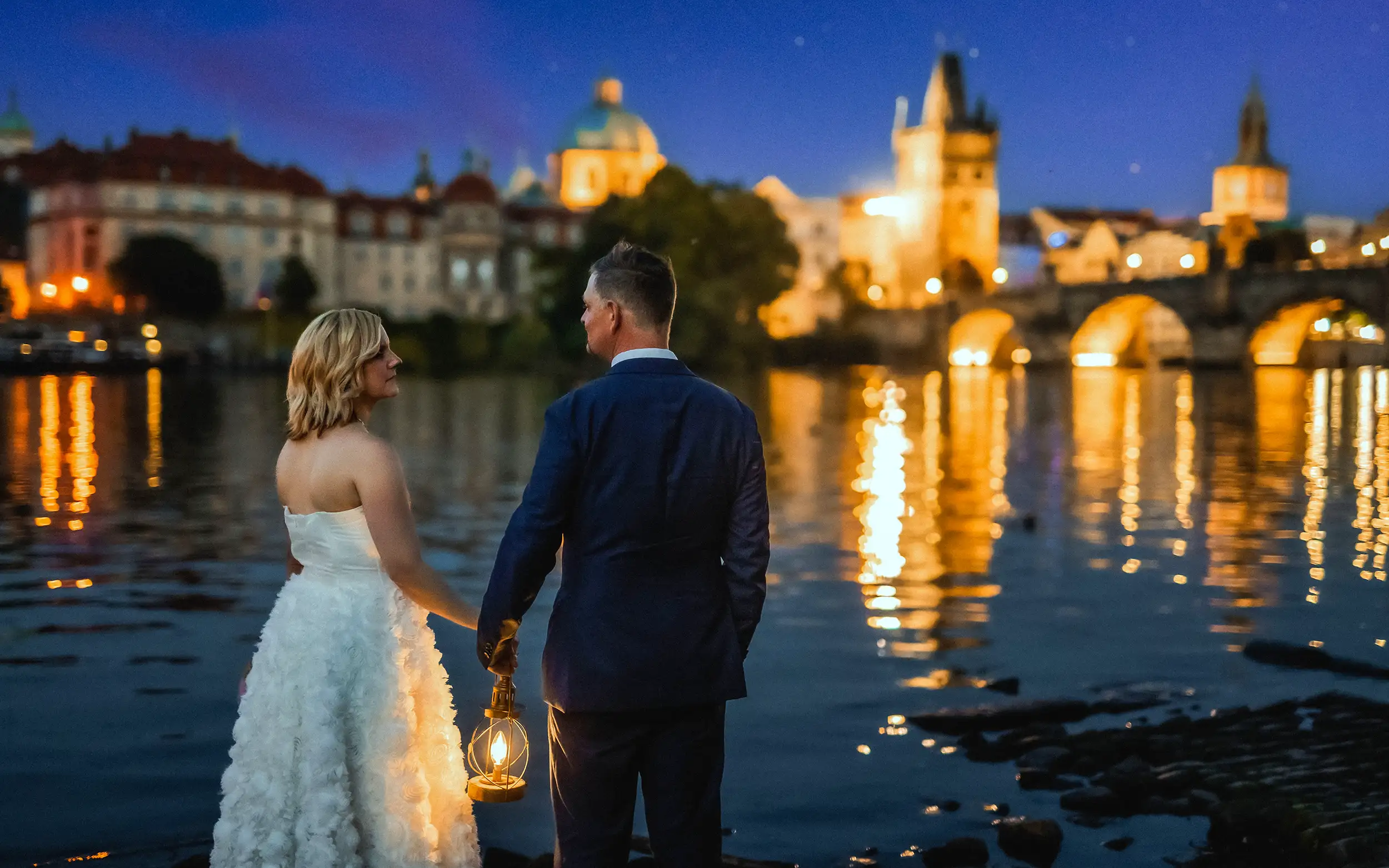 groom and bride navlavka prague at night with a lantern - wedding cameraman prague
